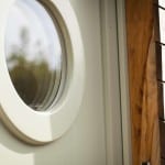 PERFORMANCE triples glazed timber door at Foor walls retrofit